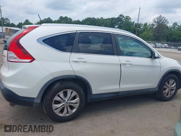 2012 Honda CR-V EX-L with VIN 5J6RM4H7XCL073555, listed as a IAAI auction lot 42750642 with 246,599 mi miles and . Bid and sale history available at DreamBid. Image 13.