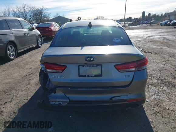 2016 Kia Optima EX with VIN 5XXGU4L36GG098749, listed as a IAAI auction lot 41191912 with 113,019 mi miles and . Bid and sale history available at DreamBid. Image 16.