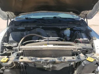 2018 Ram 1500 Tradesman with VIN 3C6RR7KT2JG252561, listed as a Copart auction lot 55558965 with 141,451 mi miles and Salvage title. Bid and sale history available at DreamBid. Image 11.