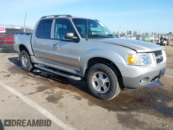 2003 Ford Explorer Sport Trac XLS z VIN 1FMZU77E13UC70465, wystawiony jako IAAI lot #42079056 z przebiegiem 123 046 mil mil oraz . Historia ofert i sprzedaży dostępna na DreamBid. Obrazek 1.
