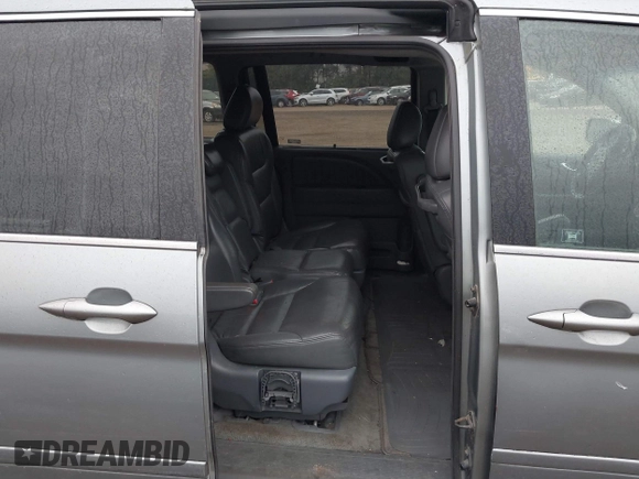2005 Honda Odyssey EX-L with VIN 5FNRL38625B041067, listed as a IAAI auction lot 40519464 with 117,606 mi miles and . Bid and sale history available at carsss.com. Image 8.