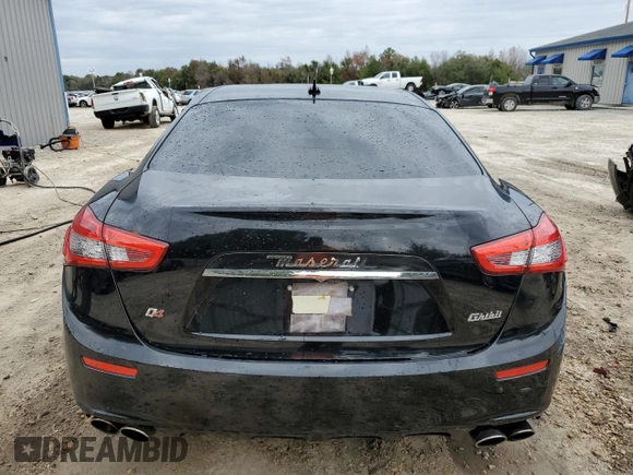 2015 Maserati Ghibli S Q4 with VIN ZAM57RTA8F1144369, listed as a Copart auction lot 77810033 with 82,749 mi miles. Bid and sale history available at carsss.com. Image 6.