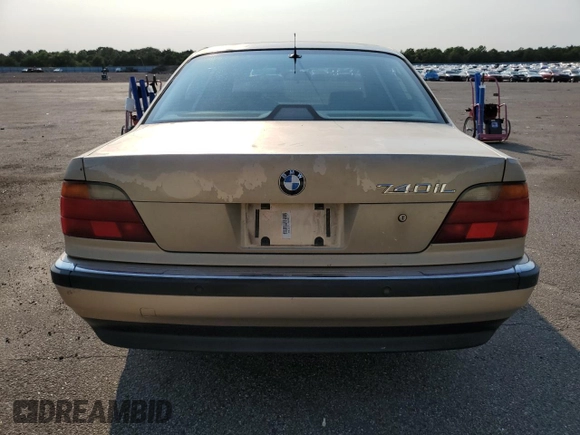 1997 BMW 7 Series 740il with VIN WBAGJ8325VDM04352, listed as a Copart auction lot 70189534 with 129,463 mi miles and Salvage Title. Bid and sale history available at carsss.com. Image 6.