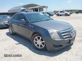 2009 Cadillac CTS RWD with VIN 1G6DF577290126330, listed as a IAAI auction lot 42470799 with 219,788 mi miles and . Bid and sale history available at DreamBid. Image 1.
