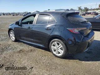 2021 Toyota Corolla Hatchback SE with VIN JTND4MBE4M3115822, listed as a Copart auction lot 77622034 with 83,268 mi miles and Salvage Title. Bid and sale history available at carsss.com. Image 2.