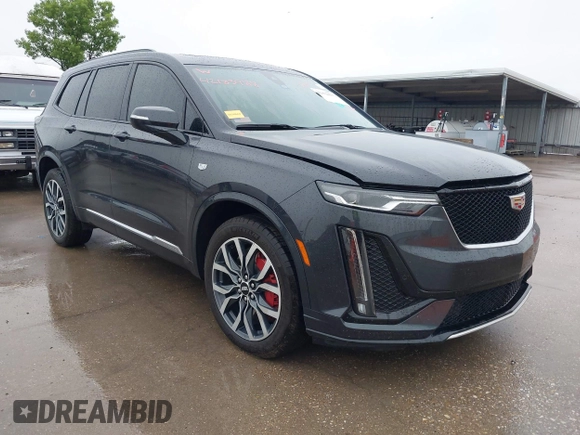 2023 Cadillac XT6 AWD Sport with VIN 1GYKPGRS0PZ177620, listed as a IAAI auction lot 42432423 with 24,070 mi miles and . Bid and sale history available at DreamBid. Image 1.