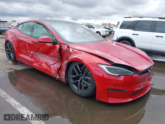 2022 Tesla Model S Plaid z VIN 5YJSA1E61NF485055, wystawiony jako IAAI lot #41751134 z przebiegiem Nie podano mil oraz . Historia ofert i sprzedaży dostępna na DreamBid. Obrazek 1.