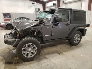 2016 Jeep Wrangler Rubicon z VIN 1C4BJWCGXGL336250, wystawiony jako Copart lot #54910135 z przebiegiem Nie podano mil oraz Szkoda całkowita • Salvage title. Historia ofert i sprzedaży dostępna na DreamBid. Obrazek 1.