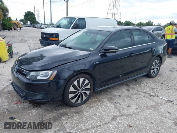 2013 Volkswagen Jetta Hybrid SE with VIN 3VW637AJ0DM281198, listed as a IAAI auction lot 42710130 with 68,068 mi miles and . Bid and sale history available at DreamBid. Image 2.