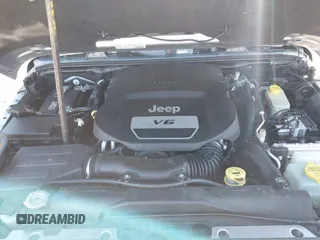 2016 Jeep Wrangler Rubicon z VIN 1C4BJWCGXGL307542, wystawiony jako IAAI lot #41407411 z przebiegiem 124 749 mil mil oraz . Historia ofert i sprzedaży dostępna na DreamBid. Obrazek 10.