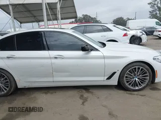 2018 BMW 5 Series 530e with VIN WBAJA9C5XJB033667, listed as a IAAI auction lot 42107936 with 55,753 mi miles and . Bid and sale history available at DreamBid. Image 14.