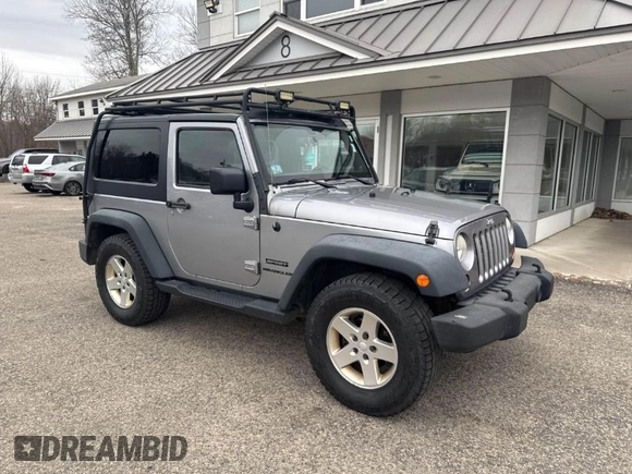 2013 Jeep Wrangler Sport with VIN 1C4AJWAG7DL605881, listed as a IAAI auction lot 41980930 with 214,662 mi miles and . Bid and sale history available at carsss.com. Image 1.