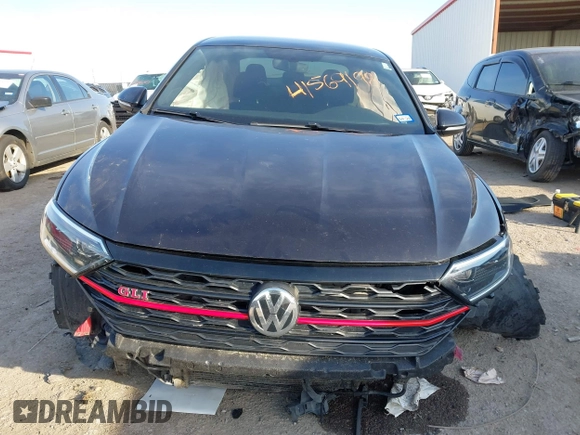 2019 Volkswagen Jetta GLI S z VIN 3VW5T7BU3KM245927, wystawiony jako IAAI lot #41573257 z przebiegiem 57 322 mil mil oraz . Historia ofert i sprzedaży dostępna na DreamBid. Obrazek 13.