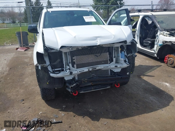 2021 GMC Canyon 4WD AT4 z VIN 1GTG6FENXM1291689, wystawiony jako IAAI lot #42038884 z przebiegiem 54 884 mil mil oraz . Historia ofert i sprzedaży dostępna na DreamBid. Obrazek 6.