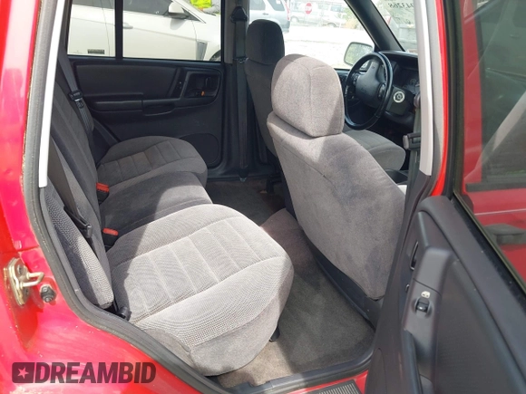 1996 Jeep Grand Cherokee Laredo with VIN 1J4FX58S4TC346218, listed as a IAAI auction lot 41943268 with 138,431 mi miles and . Bid and sale history available at DreamBid. Image 8.