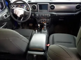 2019 Jeep Wrangler Unlimited Sport S with VIN 1C4HJXDG4KW599193, listed as a Copart auction lot 58918705 with 56,232 mi miles and Salvage title. Bid and sale history available at DreamBid. Image 8.