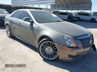 2010 Cadillac CTS Luxury with VIN 1G6DE5EG6A0107337, listed as a IAAI auction lot 40464109 with 181,609 mi miles. Bid and sale history available at carsss.com. Image 1.