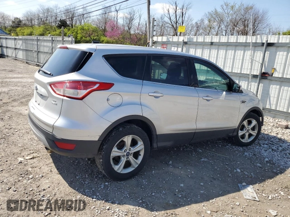 2014 Ford Escape SE with VIN 1FMCU9GX5EUC69499, listed as a Copart auction lot 51787225 with 200,898 mi miles and Salvage Title. Bid and sale history available at DreamBid. Image 3.