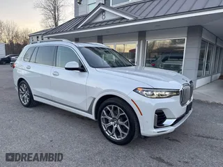 2020 BMW X7 xDrive40i with VIN 5UXCW2C05L9A03397, listed as a IAAI auction lot 41381437 with 141,656 mi miles. Bid and sale history available at carsss.com. Image 1.