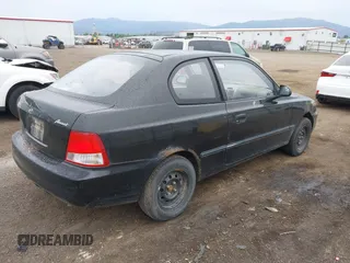 2000 Hyundai Accent z VIN KMHCF35G7YU015260, wystawiony jako IAAI lot #42322886 z przebiegiem 273 445 mil mil oraz . Historia ofert i sprzedaży dostępna na DreamBid. Obrazek 4.