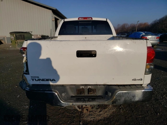 2012 Toyota Tundra z VIN 5TFUM5F13CX029961, wystawiony jako Copart lot #81052414 z przebiegiem Nie podano mil oraz Szkoda całkowita • Salvage title. Historia ofert i sprzedaży dostępna na DreamBid. Obrazek 6.