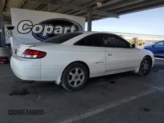 1999 Toyota Solara SE z VIN 2T1CF22P4XC171139, wystawiony jako Copart lot #58728195 z przebiegiem 148 703 mil mil oraz Szkody całkowita. Historia ofert i sprzedaży dostępna na DreamBid. Obrazek 3.
