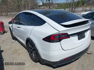 2023 Tesla Model X with VIN 7SAXCDE50PF414198, listed as a IAAI auction lot 41880957 with Not Provided miles and . Bid and sale history available at DreamBid. Image 3.