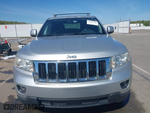 2011 Jeep Grand Cherokee Laredo z VIN 1J4RR4GGXBC571823, wystawiony jako IAAI lot #42093768 z przebiegiem 153 978 mil mil oraz . Historia ofert i sprzedaży dostępna na DreamBid. Obrazek 12.