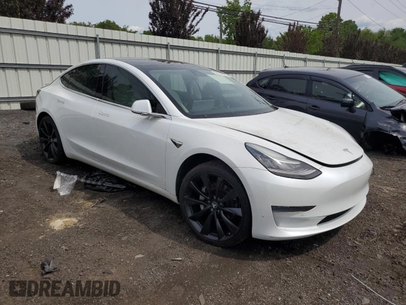 2019 Tesla Model 3 Mid Range z VIN 5YJ3E1EA2KF486532, wystawiony jako Copart lot #58082635 z przebiegiem 51 920 mil mil oraz Tytuł czysty. Historia ofert i sprzedaży dostępna na DreamBid. Obrazek 4.
