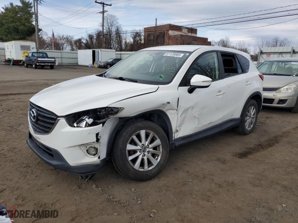 2016 Mazda CX-5 Touring with VIN JM3KE4CY5G0633095, listed as a Copart auction lot 51128965 with 126,351 mi miles and Salvage Title. Bid and sale history available at carsss.com. Image 1.