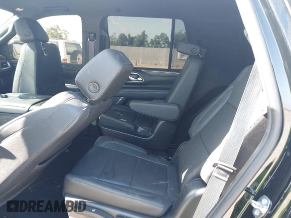 2023 Chevrolet Tahoe LT z VIN 1GNSCNKDXPR477061, wystawiony jako IAAI lot #42225743 z przebiegiem 57 077 mil mil oraz . Historia ofert i sprzedaży dostępna na DreamBid. Obrazek 8.