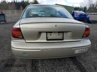 2001 Saturn SL z VIN 1G8ZG52851Z213567, wystawiony jako Copart lot #51795795 z przebiegiem Nie podano mil oraz Szkoda całkowita • Salvage title. Historia ofert i sprzedaży dostępna na DreamBid. Obrazek 6.