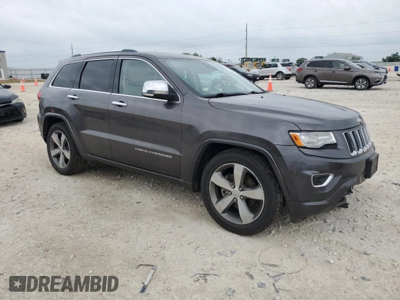 2014 Jeep Grand Cherokee Overland with VIN 1C4RJFCG9EC572237, listed as a Copart auction lot 53864865 with 90,657 mi miles and Salvage Title. Bid and sale history available at DreamBid. Image 4.