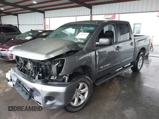 2014 Nissan Titan S with VIN 1N6AA0ECXEN504034, listed as a IAAI auction lot 39883492 with 189,529 mi miles and . Bid and sale history available at DreamBid. Image 2.