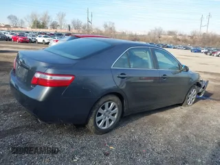 2007 Toyota Camry LE with VIN 4T1BK46KX7U525522, listed as a IAAI auction lot 41198095 with 77,465 mi miles and . Bid and sale history available at DreamBid. Image 4.