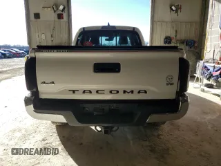 2021 Toyota Tacoma 4WD SR5 with VIN 3TMDZ5BN4MM103311, listed as a Copart auction lot 46486445 with 125,685 mi miles and Salvage Title. Bid and sale history available at carsss.com. Image 6.