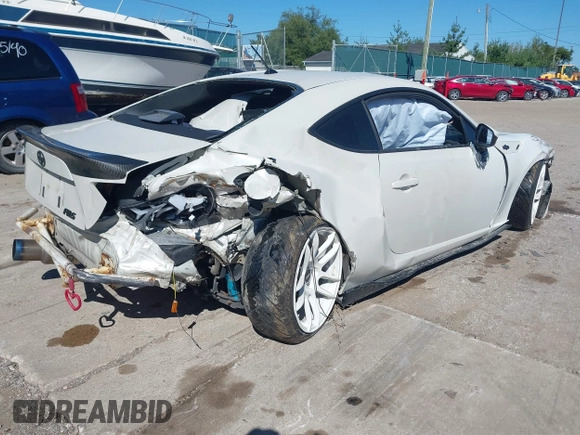 2013 Scion FR-S with VIN JF1ZNAA12D2720583, listed as a IAAI auction lot 40253195 with 113,006 mi miles. Bid and sale history available at carsss.com. Image 4.