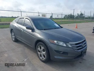 2010 Honda Crosstour EX-L z VIN 5J6TF1H50AL003802, wystawiony jako IAAI lot #42323664 z przebiegiem 110 820 mil mil oraz . Historia ofert i sprzedaży dostępna na DreamBid. Obrazek 1.