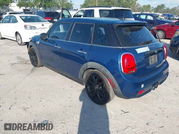2016 MINI Cooper Hardtop 4 Door S with VIN WMWXU3C54G2D30766, listed as a IAAI auction lot 42008026 with 101,898 mi miles. Bid and sale history available at carsss.com. Image 3.