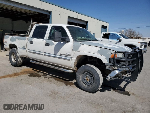 2006 GMC Sierra 2500HD SL with VIN 1GTHK23D26F158546, listed as a Copart auction lot 42225335 with 213,724 mi miles and Salvage title. Bid and sale history available at DreamBid. Image 4.