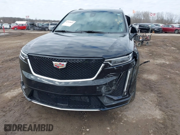 2024 Cadillac XT6 AWD Sport z VIN 1GYKPHRS8RZ750238, wystawiony jako IAAI lot #41769814 z przebiegiem 3 600 mil mil oraz . Historia ofert i sprzedaży dostępna na DreamBid. Obrazek 20.