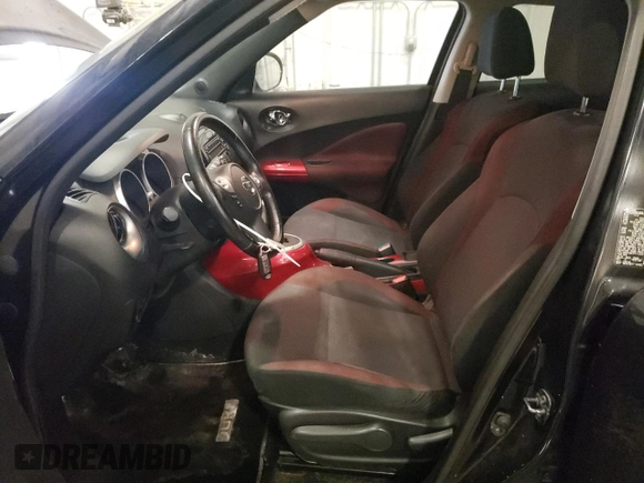 2012 Nissan Juke SL with VIN JN8AF5MV7CT116230, listed as a Copart auction lot 87816315 with 94,494 mi miles and Salvage Title. Bid and sale history available at DreamBid. Image 7.