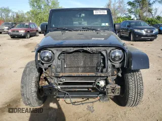2013 Jeep Wrangler Unlimited Moab with VIN 1C4HJWEG9DL667663, listed as a Copart auction lot 53716105 with 184,885 mi miles and Salvage title. Bid and sale history available at DreamBid. Image 5.