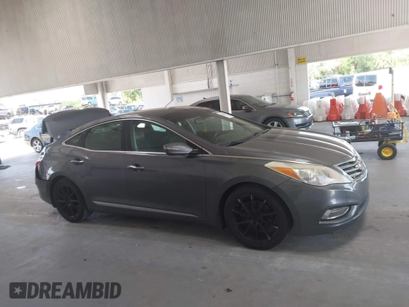 2013 Hyundai Azera with VIN KMHFH4JG3DA213459, listed as a IAAI auction lot 42642239 with 130,195 mi miles and . Bid and sale history available at DreamBid. Image 13.