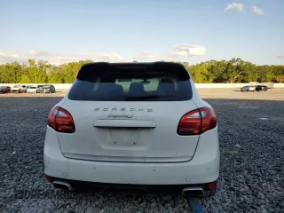 2013 Porsche Cayenne S с VIN WP1AB2A28DLA85229, выставлен на аукционе Copart как лот 50935415 с пробегом 215 629 миль миль и Списание • Salvage title. История ставок и продаж доступна на DreamBid. Изображение 6.