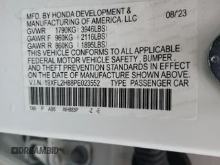 2023 Honda Civic Sport z VIN 19XFL2H88PE023552, wystawiony jako Copart lot #56878205 z przebiegiem 23 714 mil mil oraz Szkoda całkowita • Salvage title. Historia ofert i sprzedaży dostępna na DreamBid. Obrazek 12.
