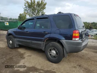 2004 Ford Escape XLS with VIN 1FMYU92104KA21454, listed as a Copart auction lot 74139564 with 217,731 mi miles and Salvage Title. Bid and sale history available at carsss.com. Image 2.