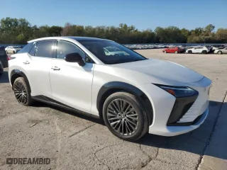 2023 Lexus RZ with VIN JTJAAAAB9PA014293, listed as a Copart auction lot 73701394 with 5,697 mi miles and Clean Title. Bid and sale history available at carsss.com. Image 4.