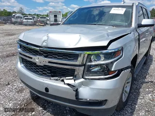 2017 Chevrolet Tahoe LS with VIN 1GNSCAEC1HR302257, listed as a IAAI auction lot 39253887 with 173,468 mi miles. Bid and sale history available at carsss.com. Image 6.