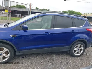 2016 Ford Escape SE z VIN 1FMCU9GX9GUB75094, wystawiony jako IAAI lot #42331270 z przebiegiem 162 288 mil mil oraz . Historia ofert i sprzedaży dostępna na DreamBid. Obrazek 14.